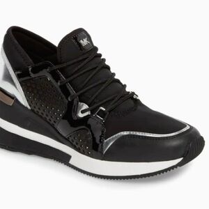 Michael Kors Black Scout
Trainer Scuba Leather Wedge
Sneaker Star size 10